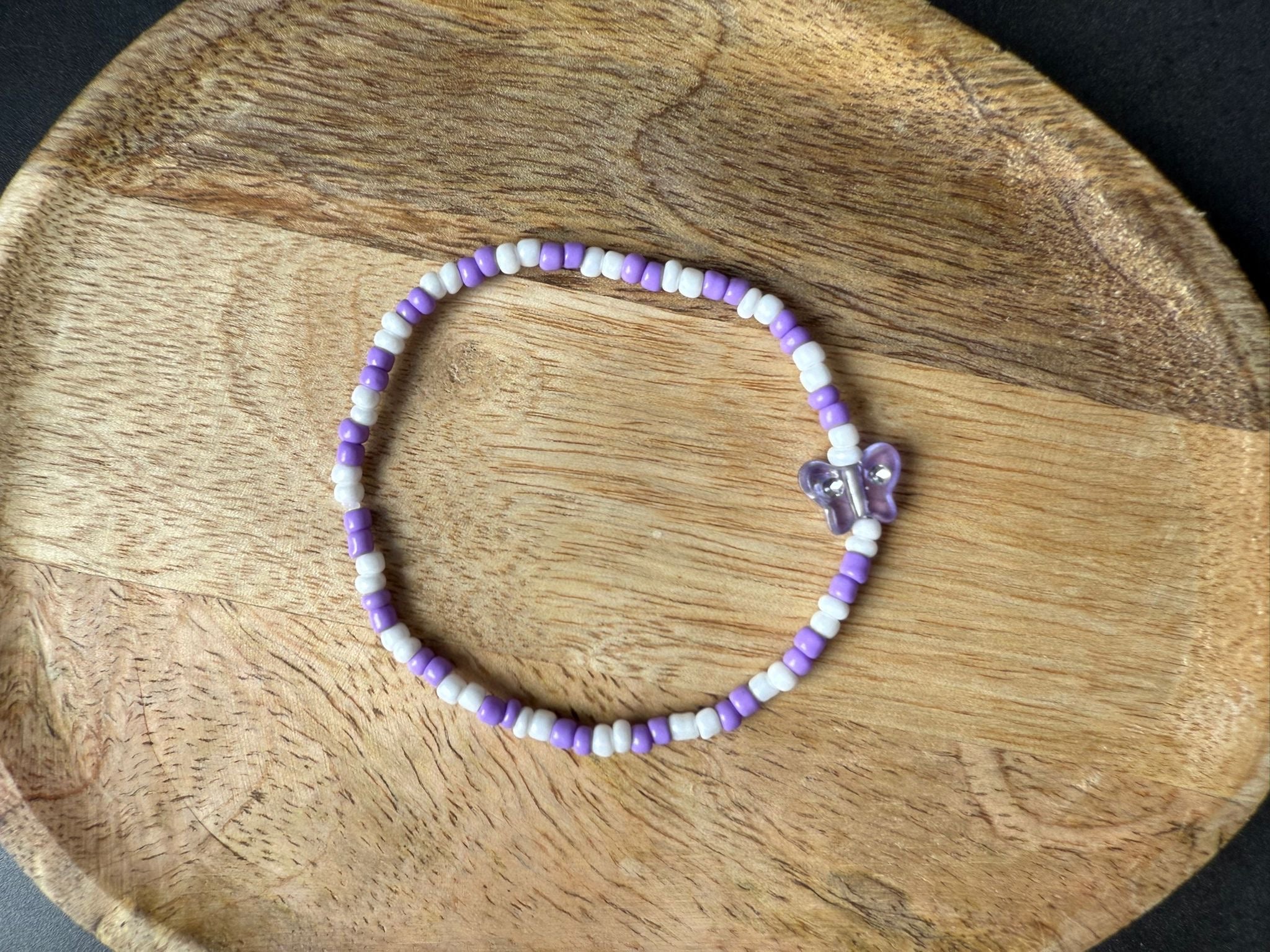 Perlenarmband mit Schmetterling