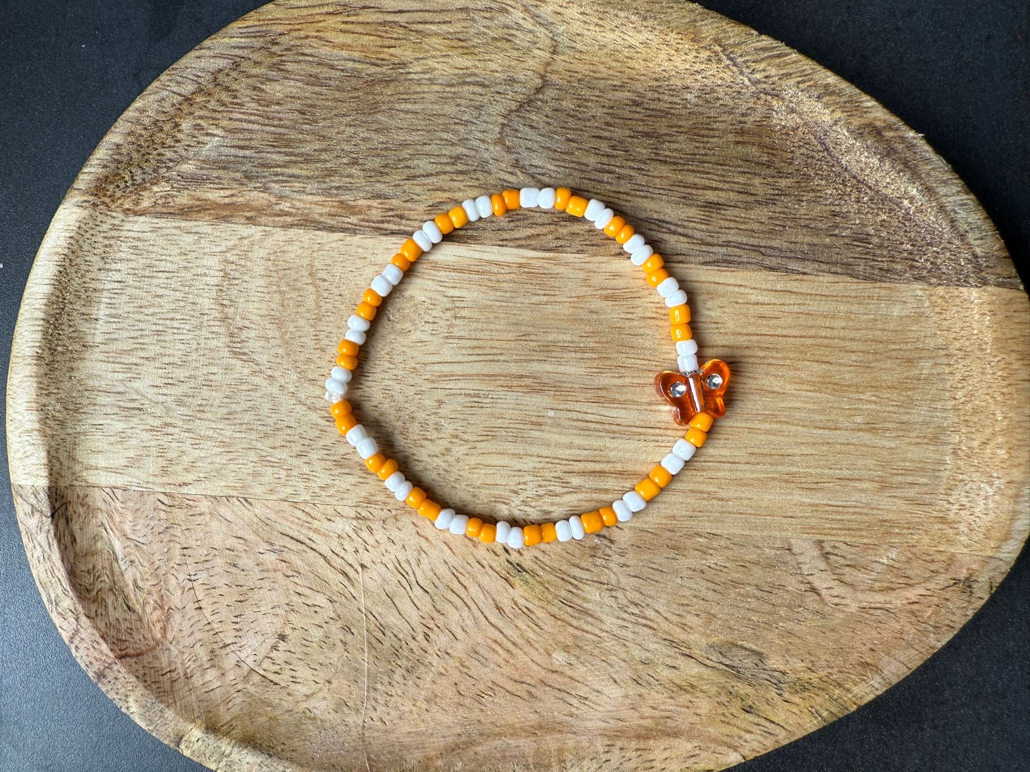 Perlenarmband mit Schmetterling